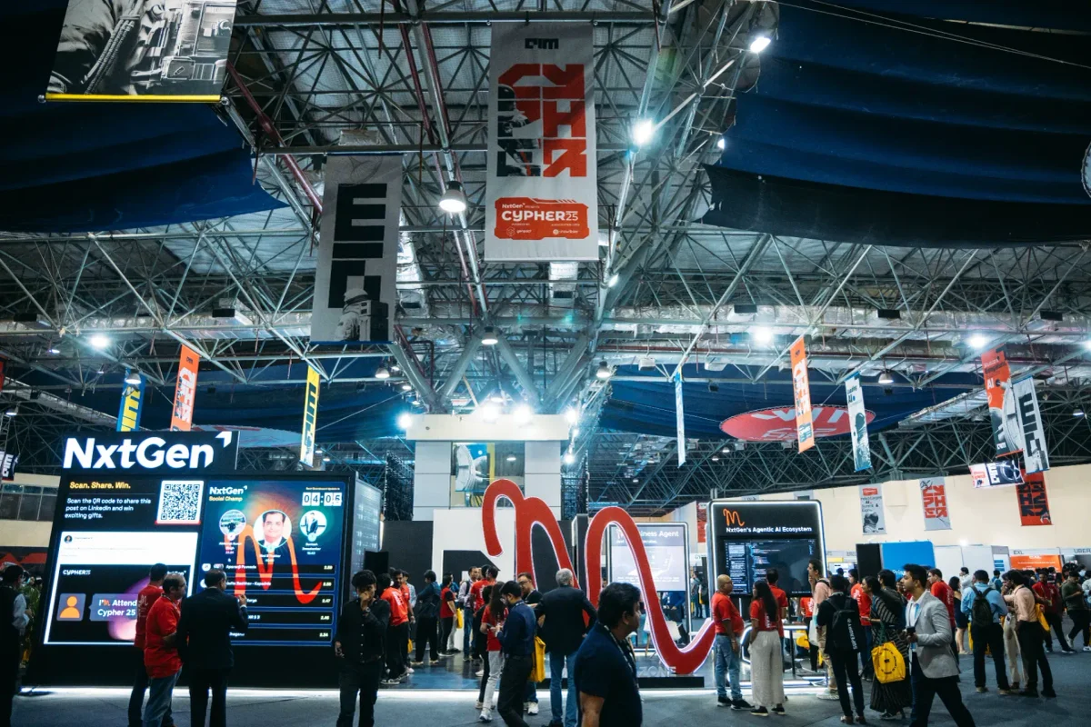 Cypher event floor featuring technology exhibits, NxtGen displays, and attendees exploring AI and cybersecurity solutions.